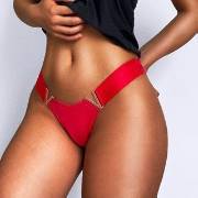 Venta al por mayor Bragas Cintura media Bragas de seda de hielo Una pieza T Back Color sólido Sin costuras Metal V Mujer Ropa interior