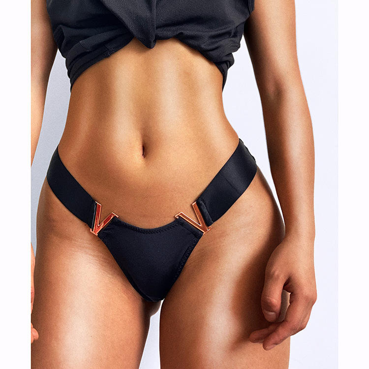 Venta al por mayor Bragas Cintura media Bragas de seda de hielo Una pieza T Back Color sólido Sin costuras Metal V Mujer Ropa interior