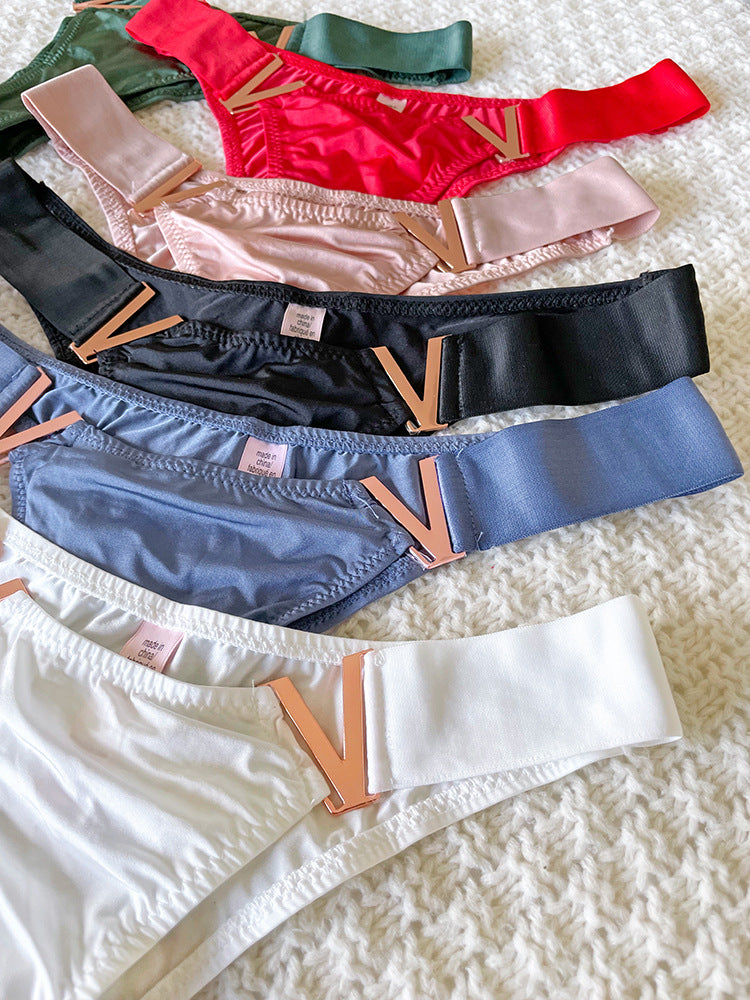 Venta al por mayor Bragas Cintura media Bragas de seda de hielo Una pieza T Back Color sólido Sin costuras Metal V Mujer Ropa interior