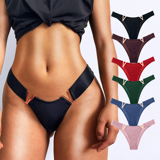 Venta al por mayor Bragas Cintura media Bragas de seda de hielo Una pieza T Back Color sólido Sin costuras Metal V Mujer Ropa interior
